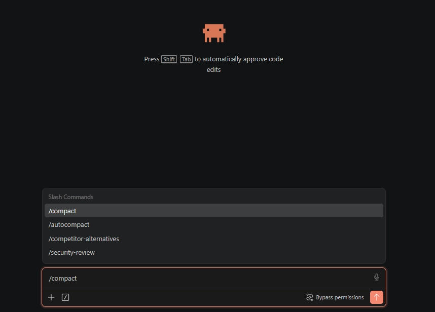 Claude Code slash command menu showing /compact and /autocompact for compressing a long session into a summary